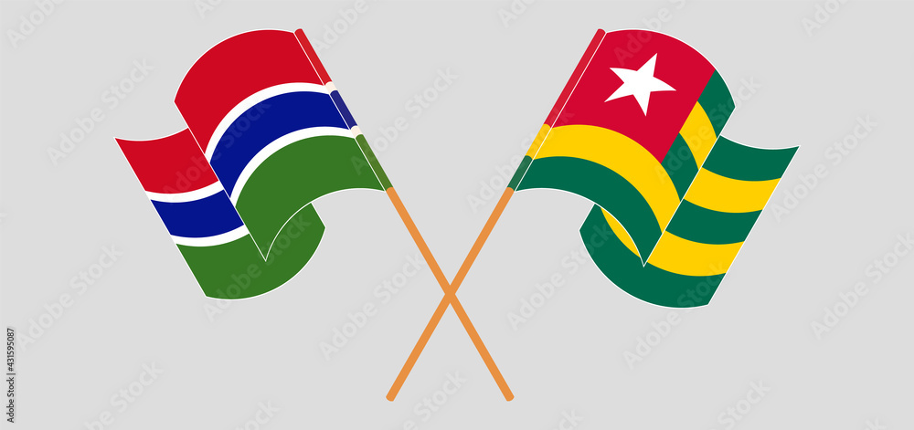 Crossed and waving flags of the Gambia and Togo Crossed and waving flags of the Gambia and Togo