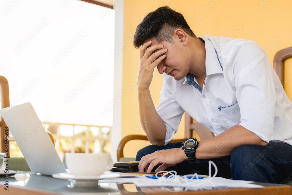 Desperate and Stressed businessman is working with laptop computer. Desperate and Stressed businessman is working with laptop computer.