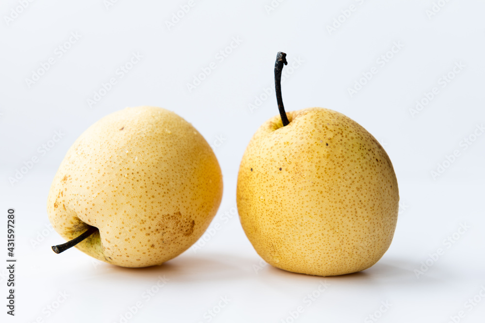 Two Asian pears isolated with a white background Two Asian pears isolated with a white background