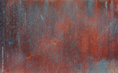 Blue and red (teal and orange) corroded metal plate surface. Rust metal texture, background.