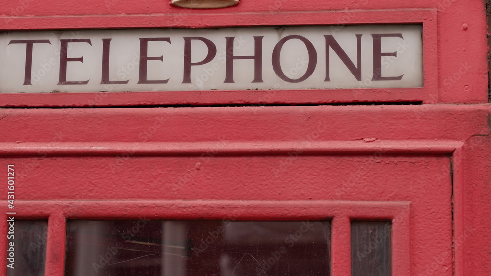Old red telephone box close-up Old red telephone box close-up