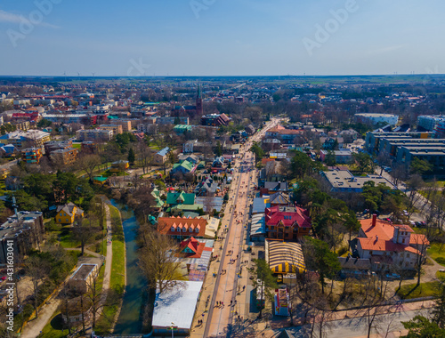 Aerial view of main pedestrian Basanavicius street in spring in Palanga resort, Lithuania with many people walking in it