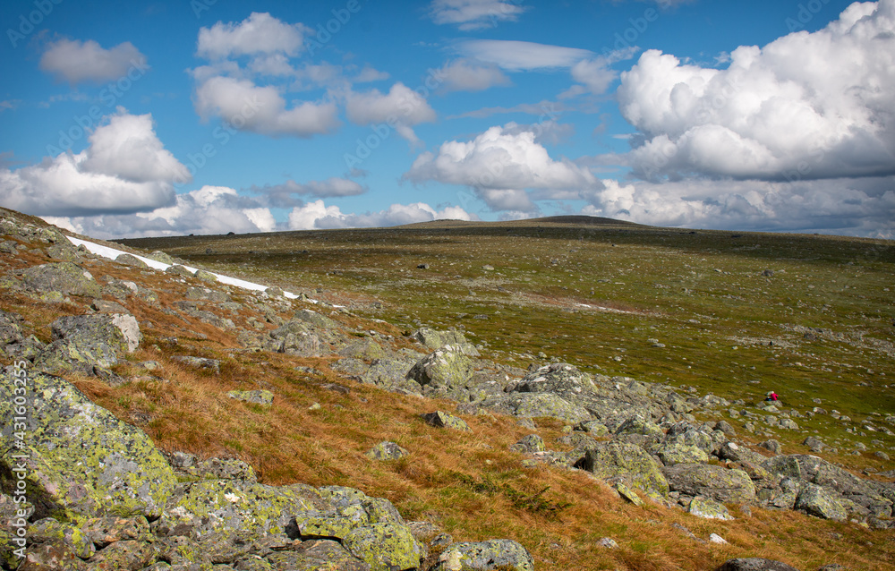 Ascending the rocky path to Skierfe mountain top, Swedish Lapland.