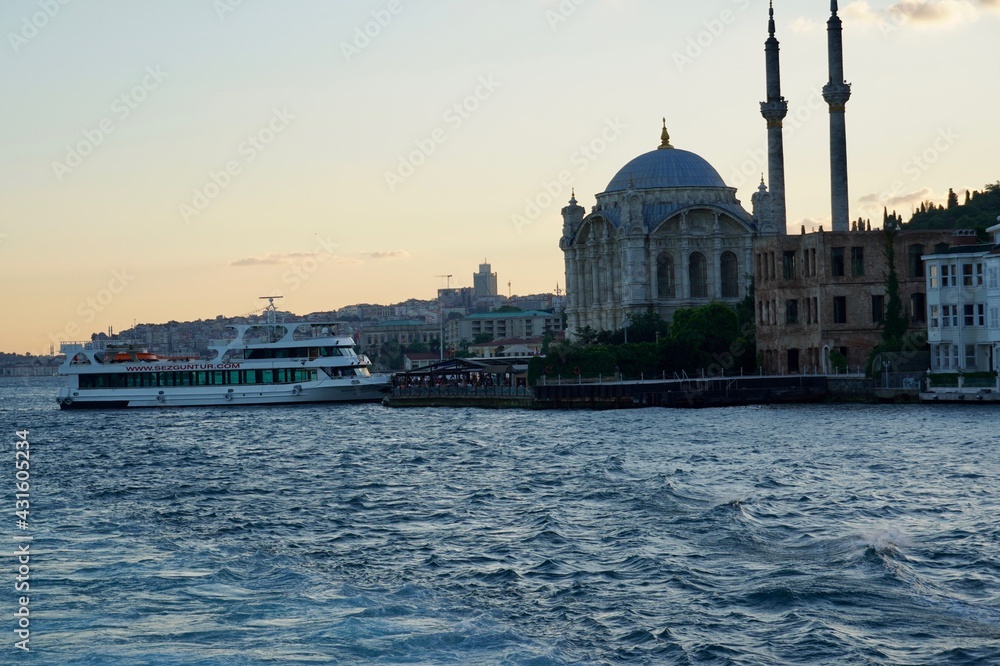 Istanbul skyline at sunset, Turkey. Beautiful cityscape of Istanbul with cruise ships. Traveling and vacation in Istanbul in summer at sunset