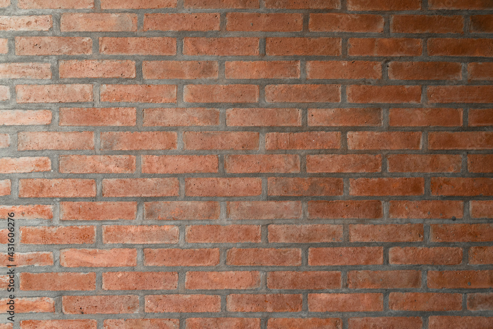 Fototapeta premium Smooth red brick wall. Texture wallpaper.