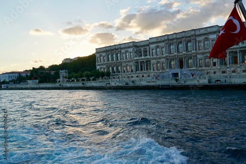 Istanbul, Bodrum - August 2020: Tour boats travel around the Bosphorus Canal on clear summer days. Sea cruise past Dolmabahce Palace