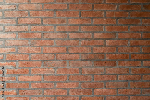 Smooth red brick wall. Texture wallpaper.
