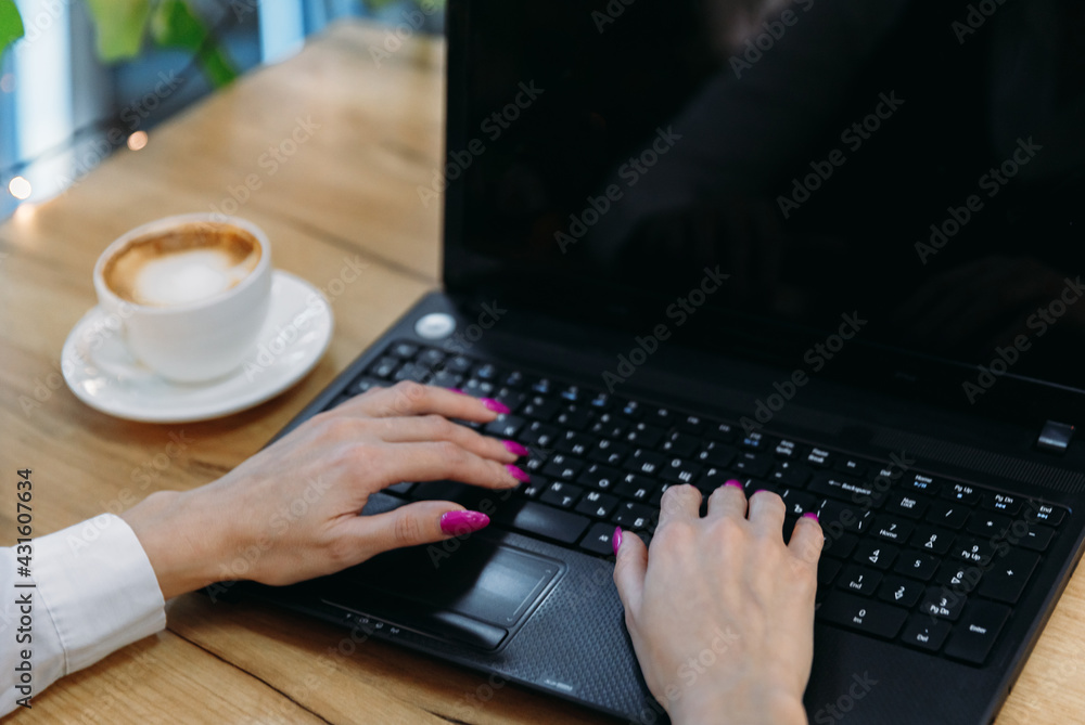 Close up of female fingers using laptop, Working woman and Online shopping concept, Selective focus Close up of female fingers using laptop, Working woman and Online shopping concept, Selective focus