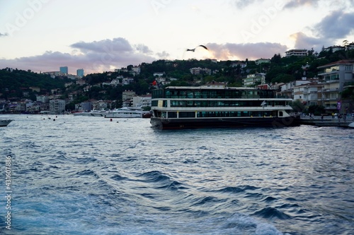 Panoramic view of the Istanbul waterfront from Golden Horn at sunset. Beautiful cityscape of Istanbul with old Galata Tower in summer.