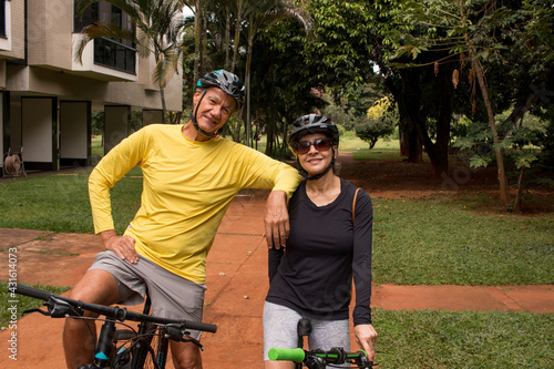 Wallpaper Mural Mature couple outdoors in an urban area on their bikes Torontodigital.ca