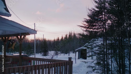 Contemplative Sunset Skies Viewed From Side Of Chalet In Estrie, Canada  photo