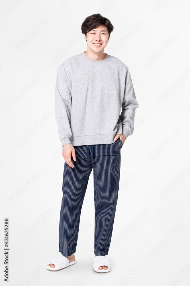 Man in gray sweater and pants sleepwear apparel full body Man in gray sweater and pants sleepwear apparel full body