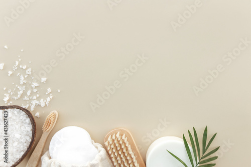 Bath accessories flat lay on beige background. Natural body care concept