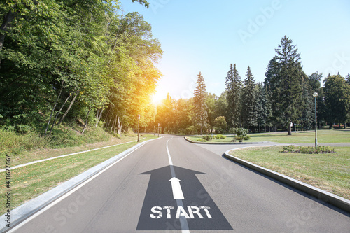 Road with arrow pointing in...