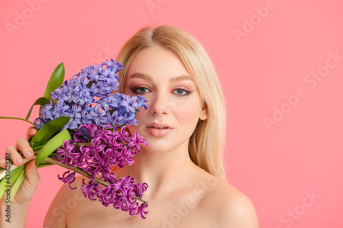Beautiful young woman with ...
