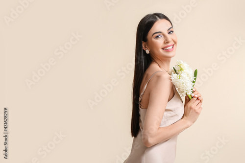 Beautiful young woman with ...