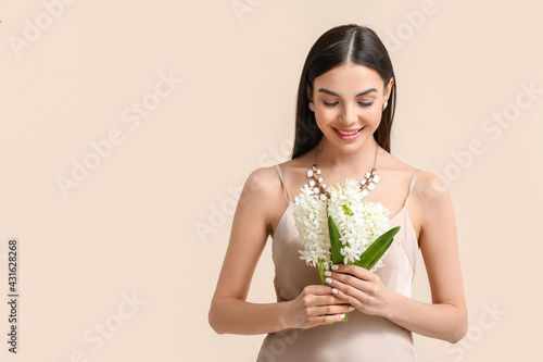 Beautiful young woman with ...