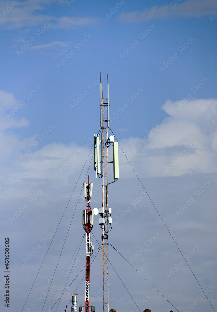 Two masts with 4G communication antennas.