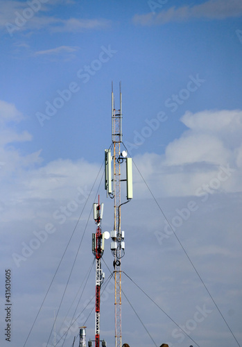 Obraz na płótnie Two masts with 4G communication antennas. w salonie