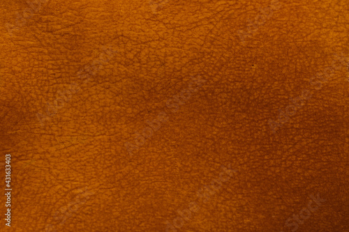 Old orange skin texture. Retro wallpaper