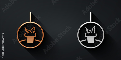Gold and silver Plant in hanging pot icon isolated on black background. Decorative macrame handmade hangers for flower pot, hang indoor plants. Long shadow style. Vector