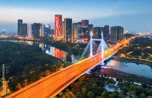 City night view of Shangbo Bridge, Yiwu City, Zhejiang Province, China photo