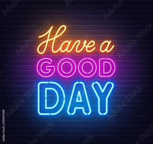 Have a Good Day neon lettering on brick wall background.