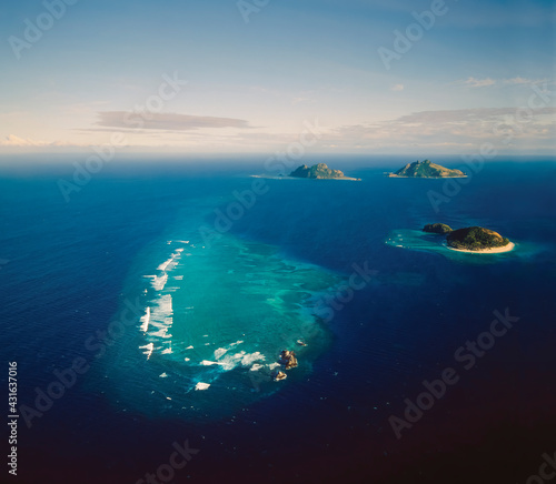 Aerial of a group of pacific atolls and reef - part of the Fiji Island group