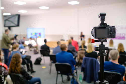 Business speaker doing presentation to audience