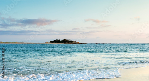 Looking across sea entrance of Maroochy River to Pincushion Island from Cotton Tree Beach photo