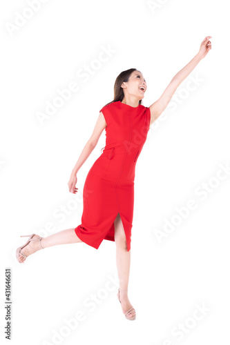 A beautiful woman in a red dress Showing a happy expression On a white background