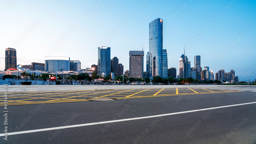 Expressway in front of the city skyline, Nanchang, China.