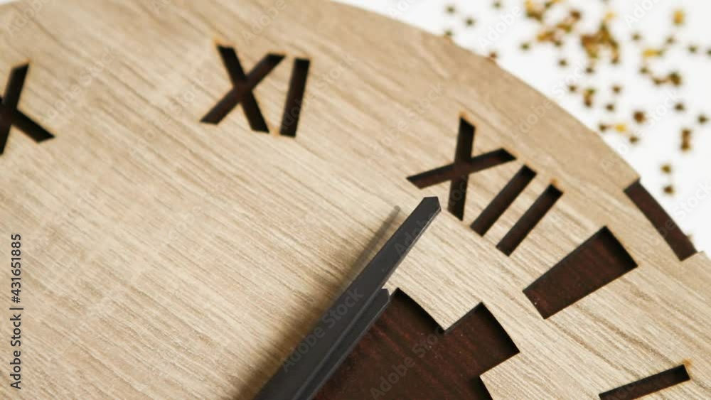 Video Stock The second, minute, and hour hands on the wooden wall clock