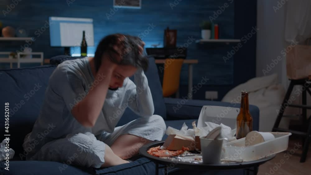 Desperate frustrated stressed single woman with headache feeling vulnerable, depressed, offended, lonely, suffering from abuse, harassment, heartbreak, grieving person with psychological problem. Desperate frustrated stressed single woman with headache feeling vulnerable, depressed, offended, lonely, suffering from abuse, harassment, heartbreak, grieving person with psychological problem.