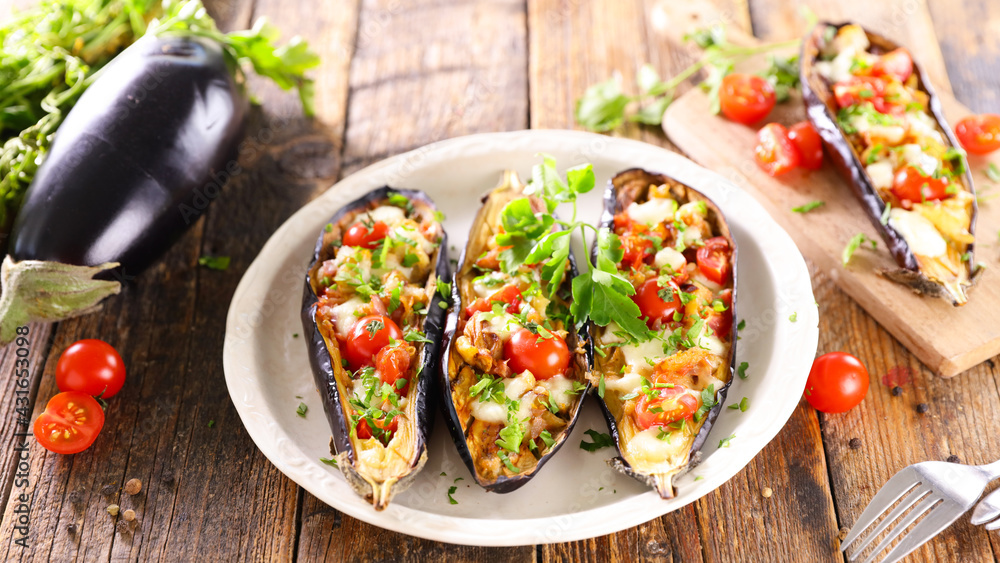 baked stuffed aubergine with vegetable and mozzarella