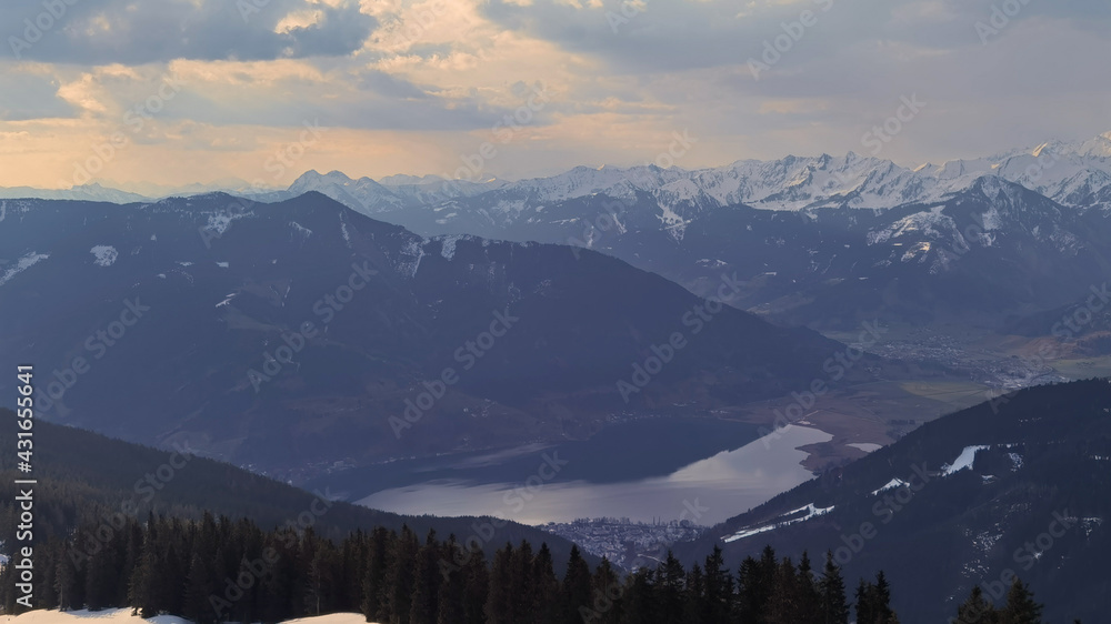 view of the lake from Zell am See in Salzburg, Austria and a panoramic view of the alps