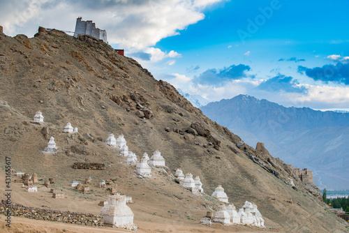 namgyal tsemo monastery on a mountain with blue sky