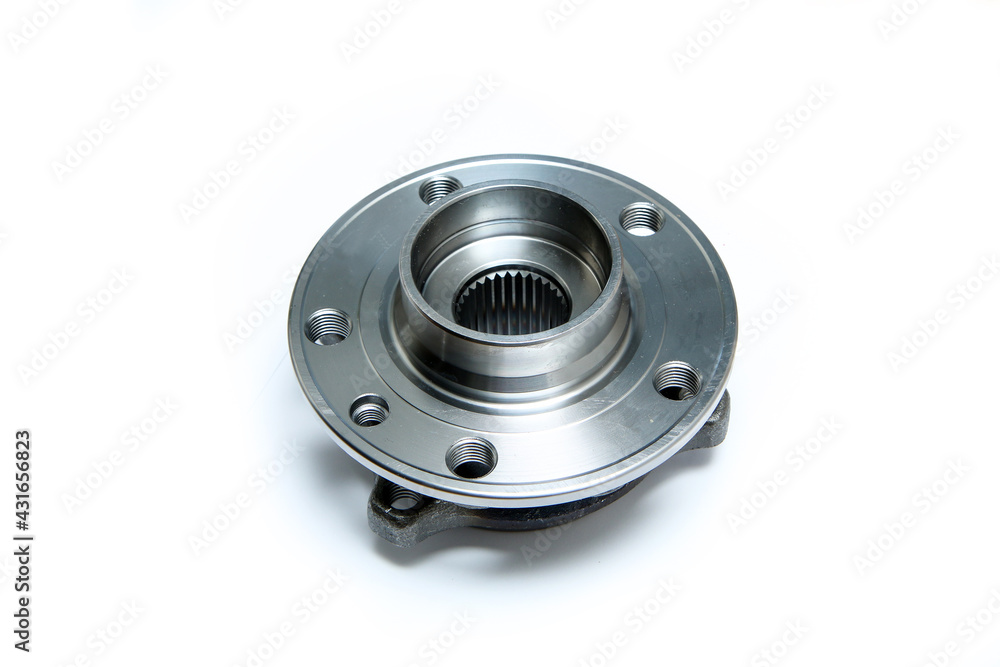 The new car wheel bearing isolated on a white background. Spare part to replace the old one. The new car wheel bearing isolated on a white background. Spare part to replace the old one.