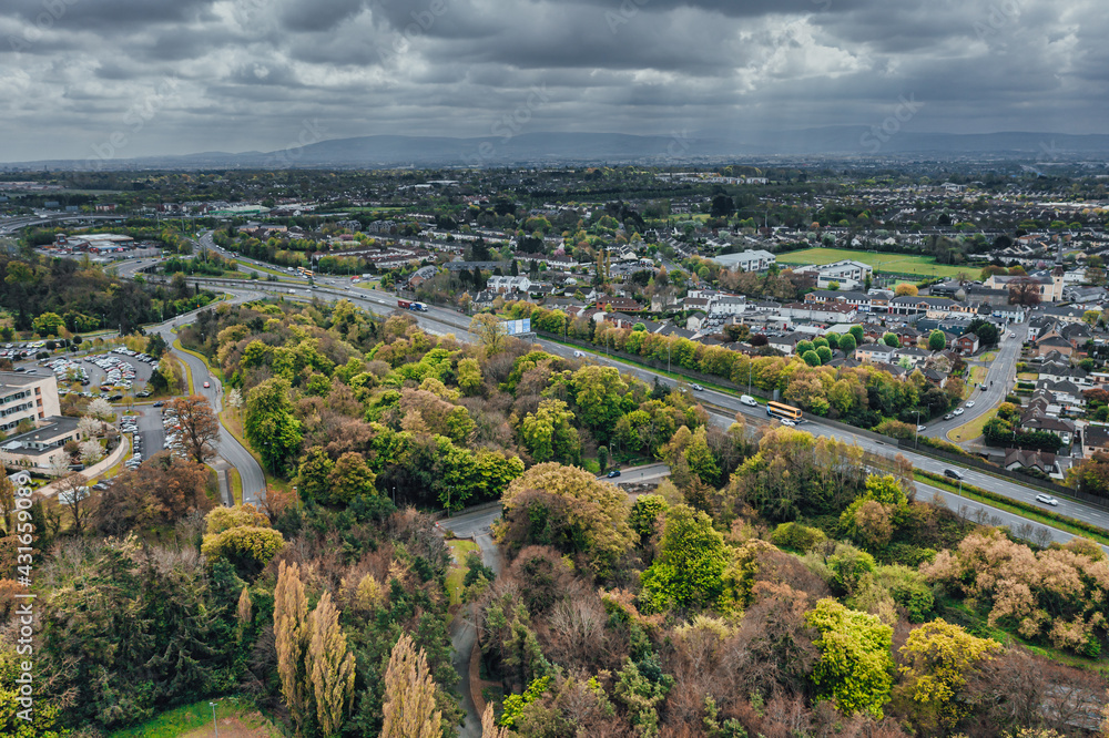Aerial view over Blanchardstown, and Navn Road, Dublin County on a spring day. Irish city and urban vegetation in spring.