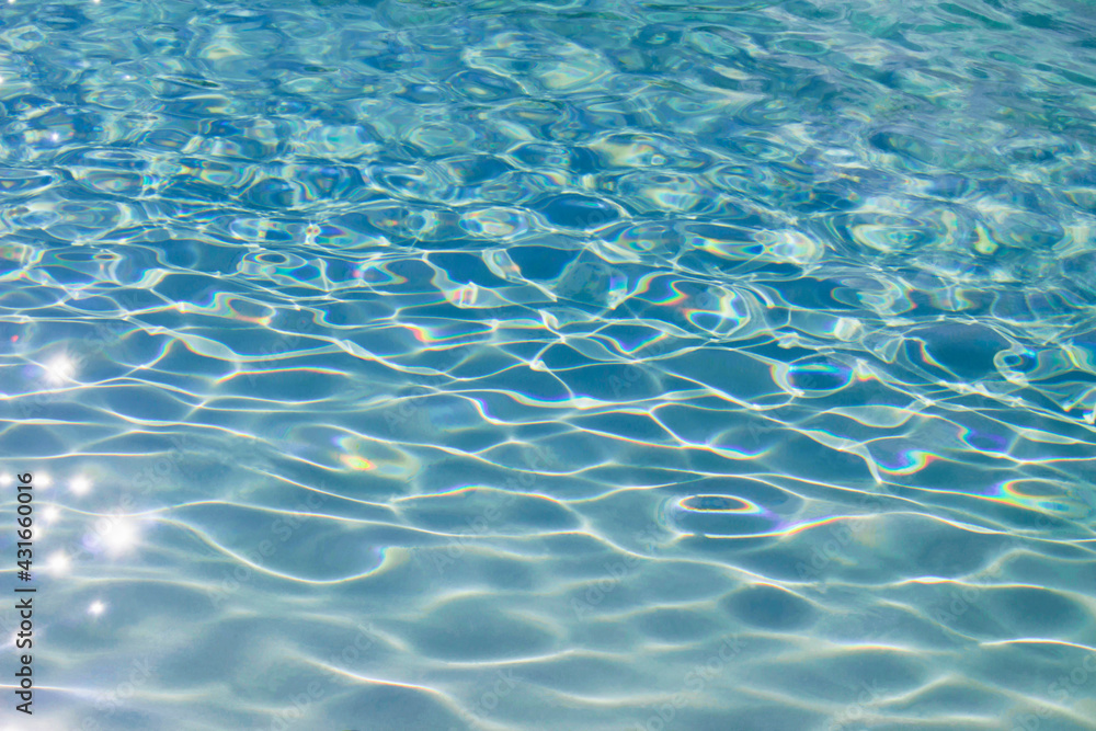 Photo for background material close up on the ripples of clear blue water shining in the sunlight Photo for background material close up on the ripples of clear blue water shining in the sunlight