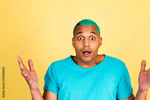 Black african man in casual on yellow background shocked with open mouth look to camera, surprised