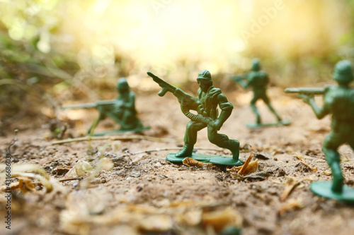 group of toy soldiers outdoors photo