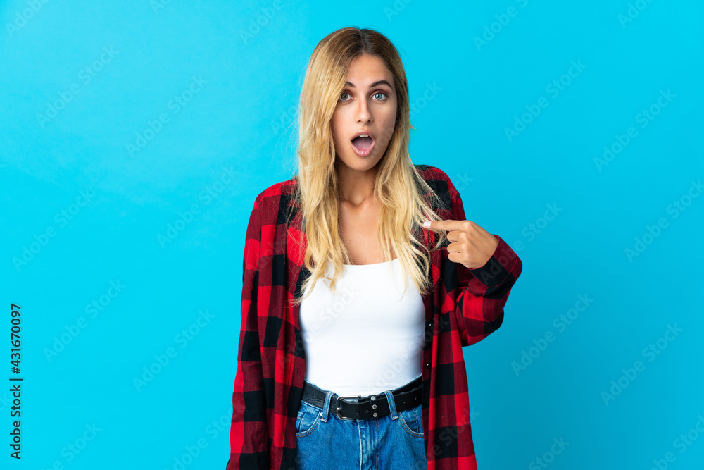 Young blonde Uruguayan woman over isolated background pointing to oneself Young blonde Uruguayan woman over isolated background pointing to oneself