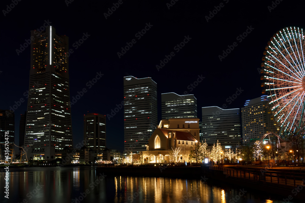 Night view of buildings in the Yokohama Minato Mirai 21 area at Christmas. Japan.