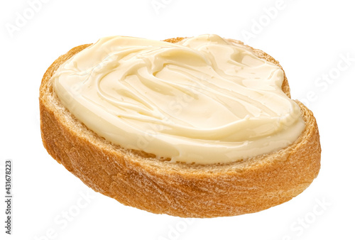 Foto Slice of bread with cream cheese isolated on white background, top view
