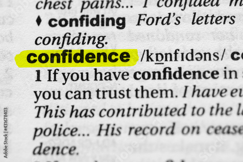 Highlighted word confidence concept and meaning. photo