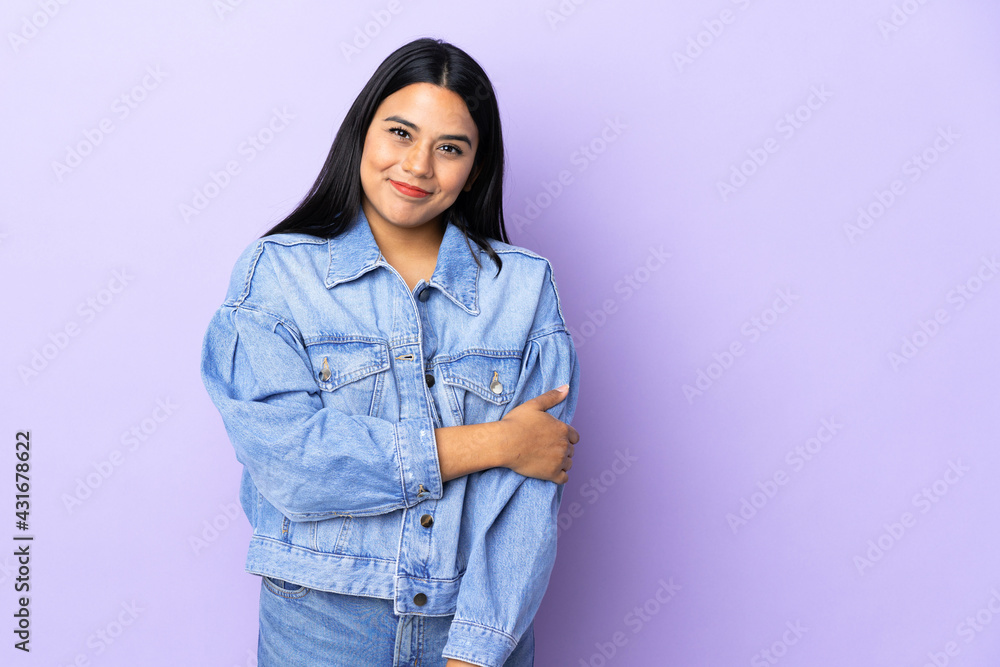 Young latin woman woman over isolated background laughing Young latin woman woman over isolated background laughing