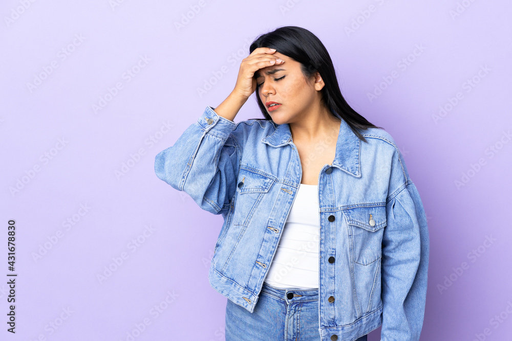 Young latin woman woman over isolated background with headache Young latin woman woman over isolated background with headache