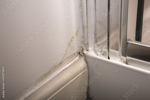 Rain water leaks on the wall causing damage and peeling paint © lukasz_kochanek