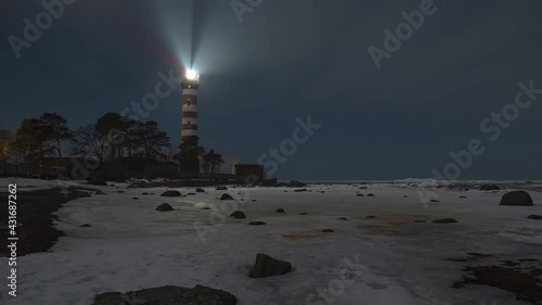 Shepelevsky lighthouse on the southern coast of the Gulf of Finland at night in winter timelapse video photo